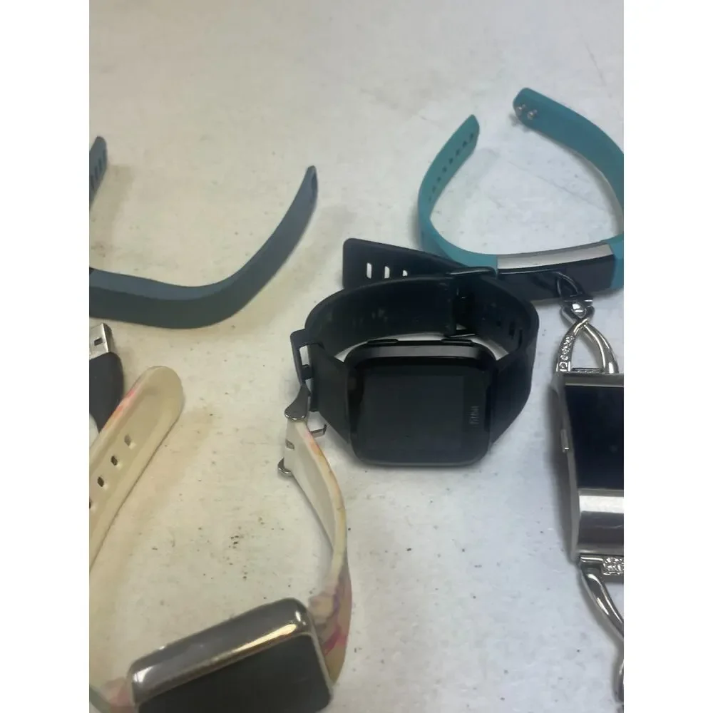 Lot of 7 Fitbit Mixed Brands Activity Tracker Smart Watches Untested For Parts
